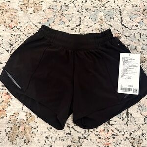 Lululemon Black Hotty Hot LR Short 4” Unlined | 2